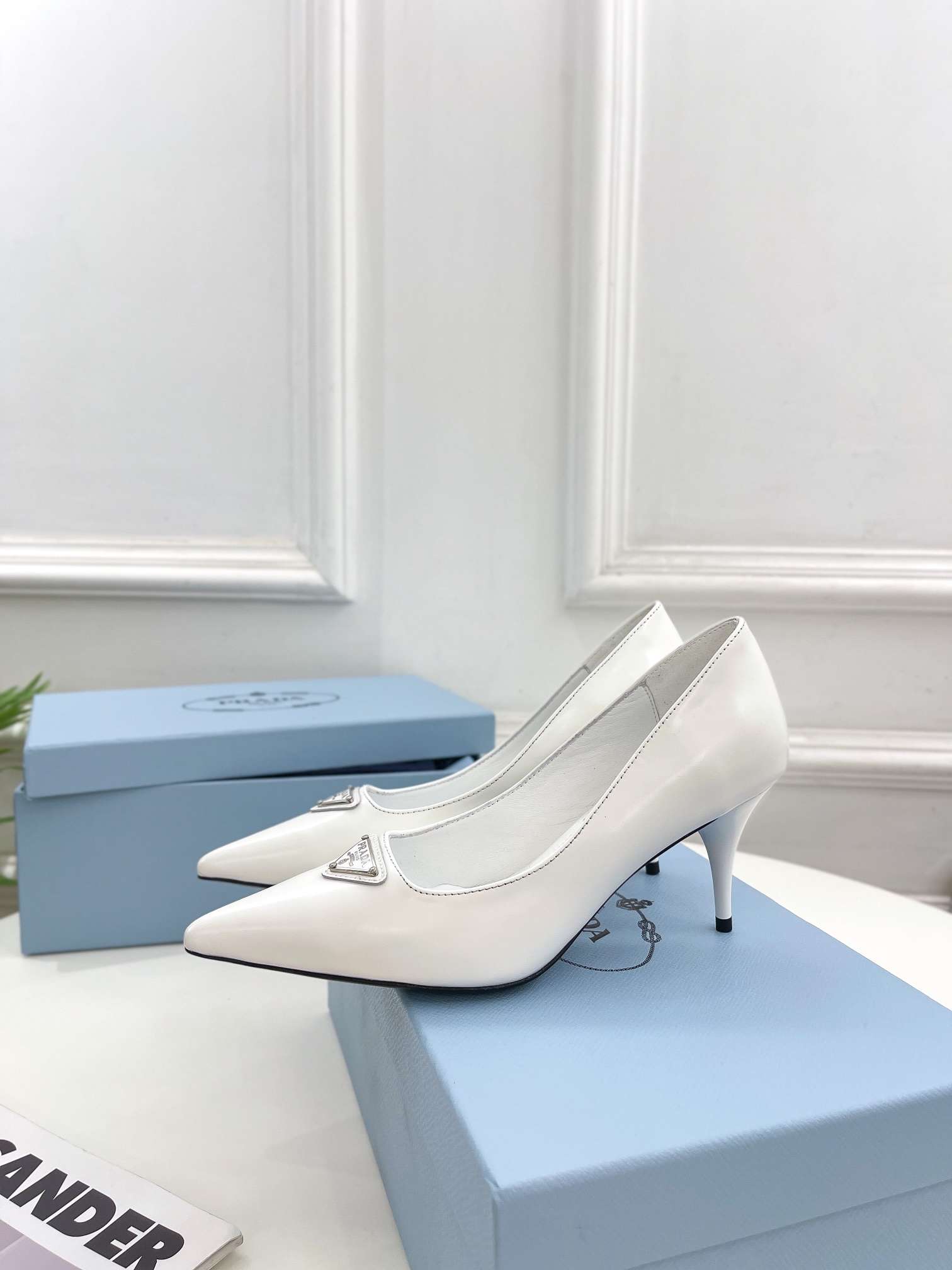 Pra*a Spike Pumps White For Women